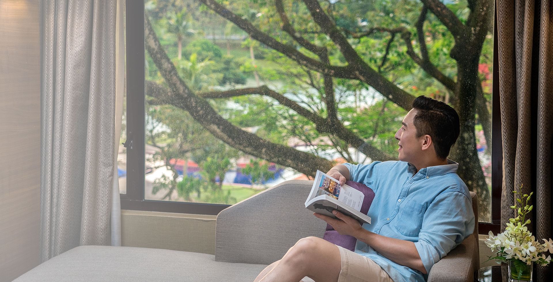 A man enjoying nature at the Saujana Hotel Kuala Lumpur
