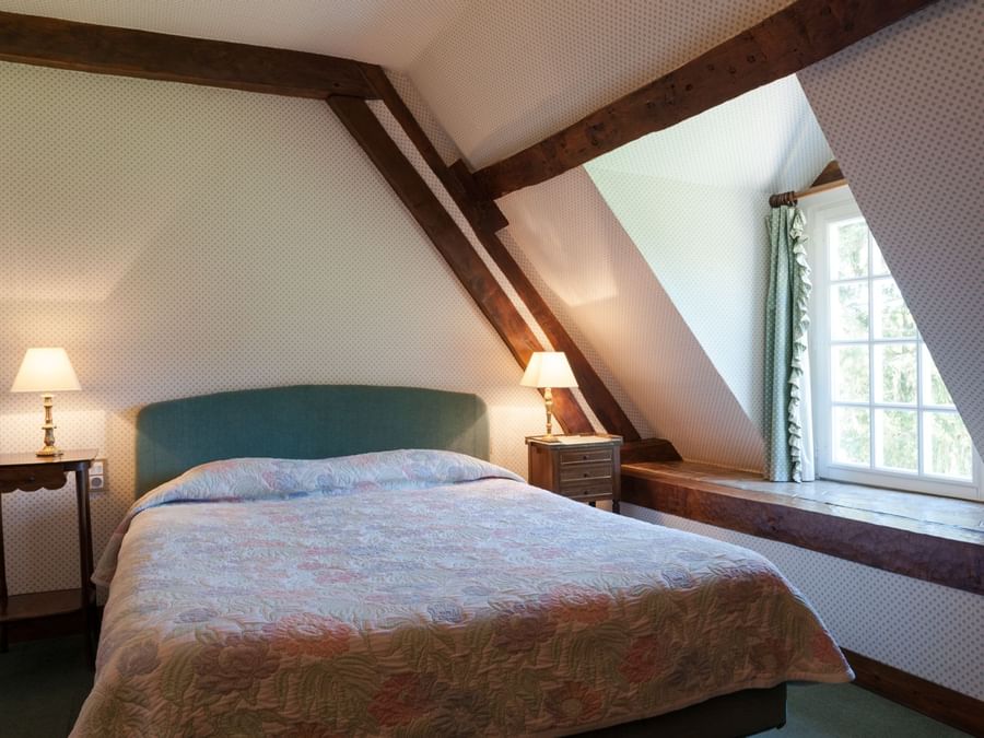 the tradition double room with king bed at The Originals Hotels