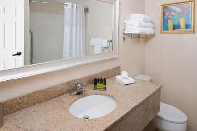 Bathroom Vanity & towels in Guest Rooms at Boxboro Regency