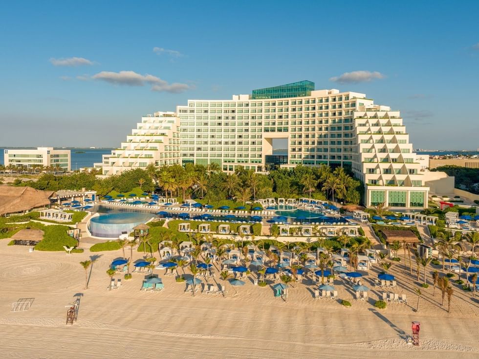 Oceanfront view of Live Aqua Beach Resort Punta Cana & beach with sun loungers