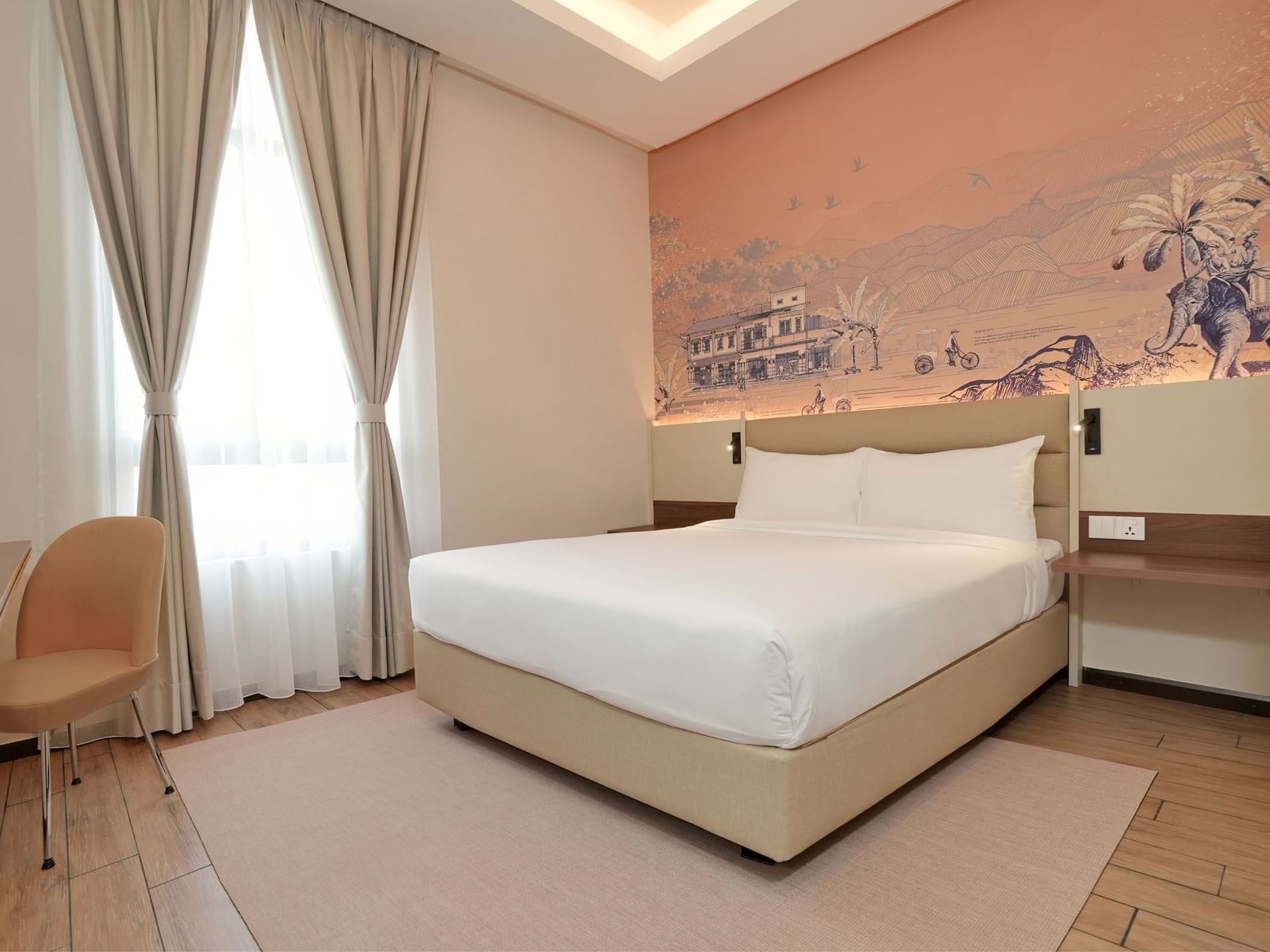 Deluxe Queen bedroom with a mural and wooden floors at Cititel Express Ipoh