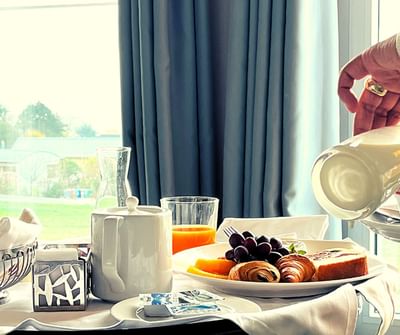 Breakfast table with pastries and fruits at Starling Hotels in Lausanne Switzerland