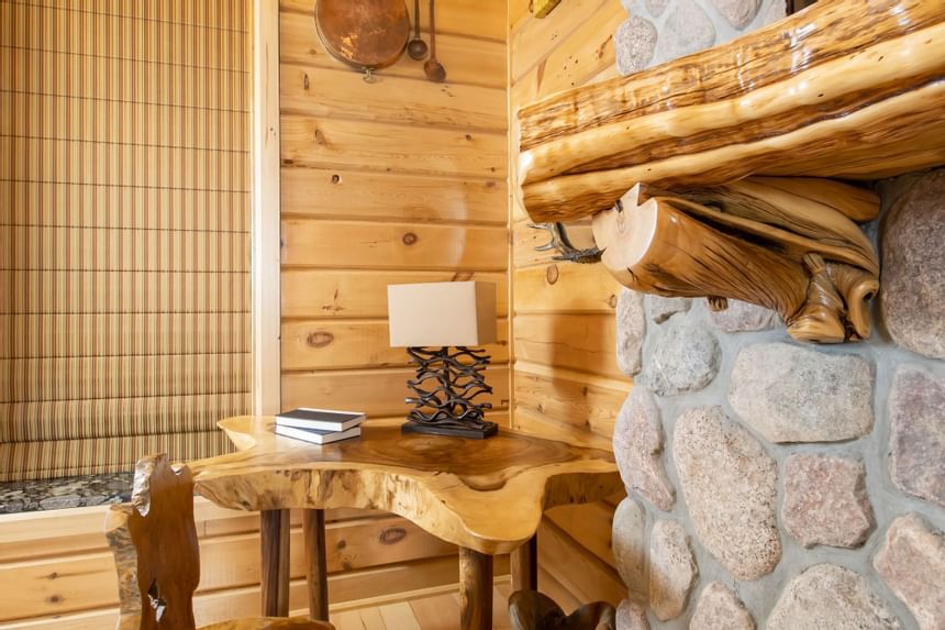 A wooden desk in King Executive Log Cabin at Retro Suites