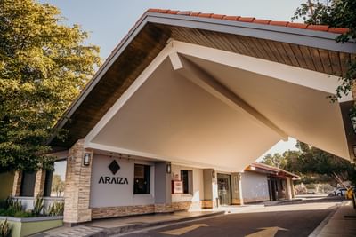 Hotel sign and motor lobby area at Araiza Hotel Calafia