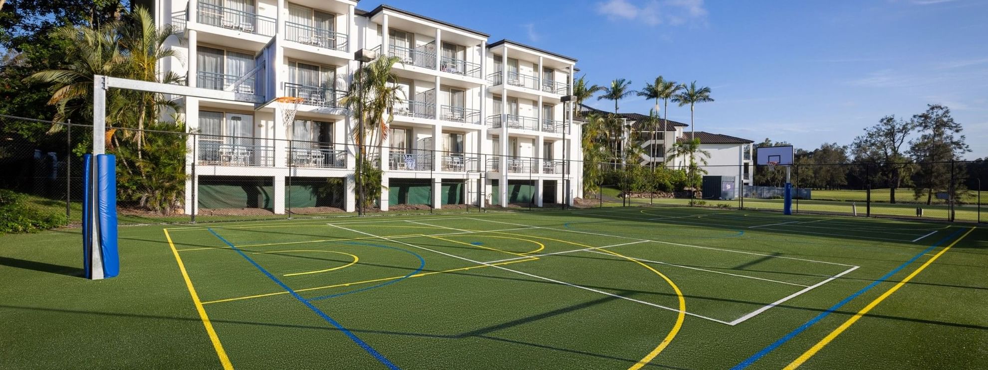 Multi Sports Courts with various markings and a basketball hoop at Mercure Gold Coast Resort in Carrara.