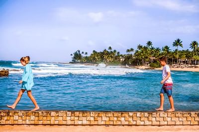 Kids Playing On Beach at Dorado Beach Resort