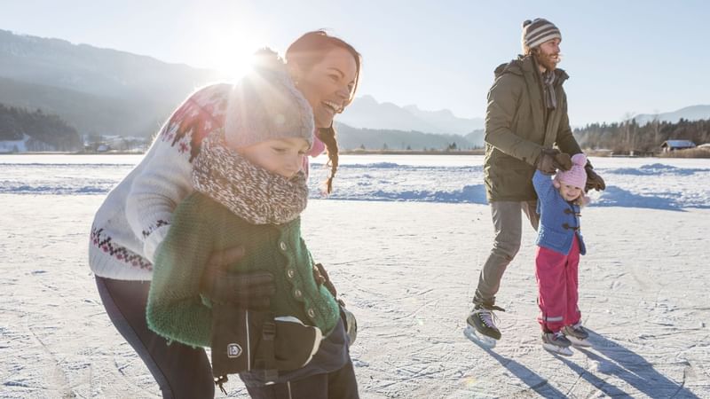 A Family enjoying on snow near Falkensteiner Hotel Funimation