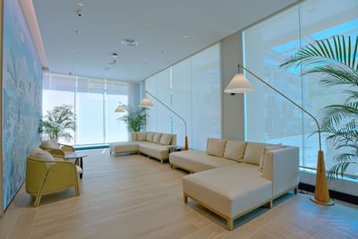 Lobby with seating area & potted plants at Cititel Express Kota Kinabalu