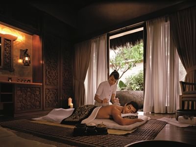 Man receiving a massage in the Wellness spa at The Banjaran Hotsprings Retreat