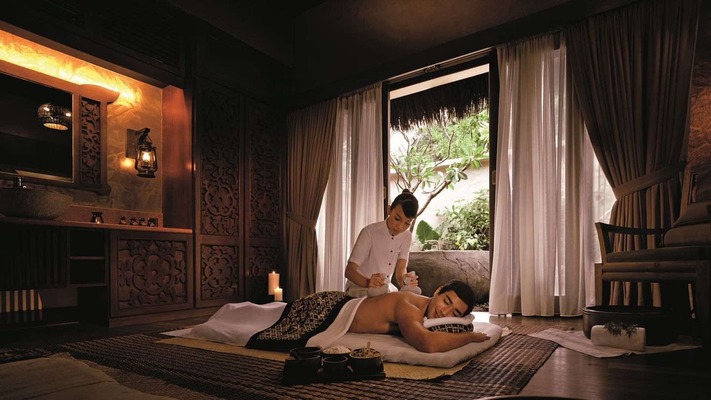 Man receiving a massage in the Wellness spa at The Banjaran Hotsprings Retreat