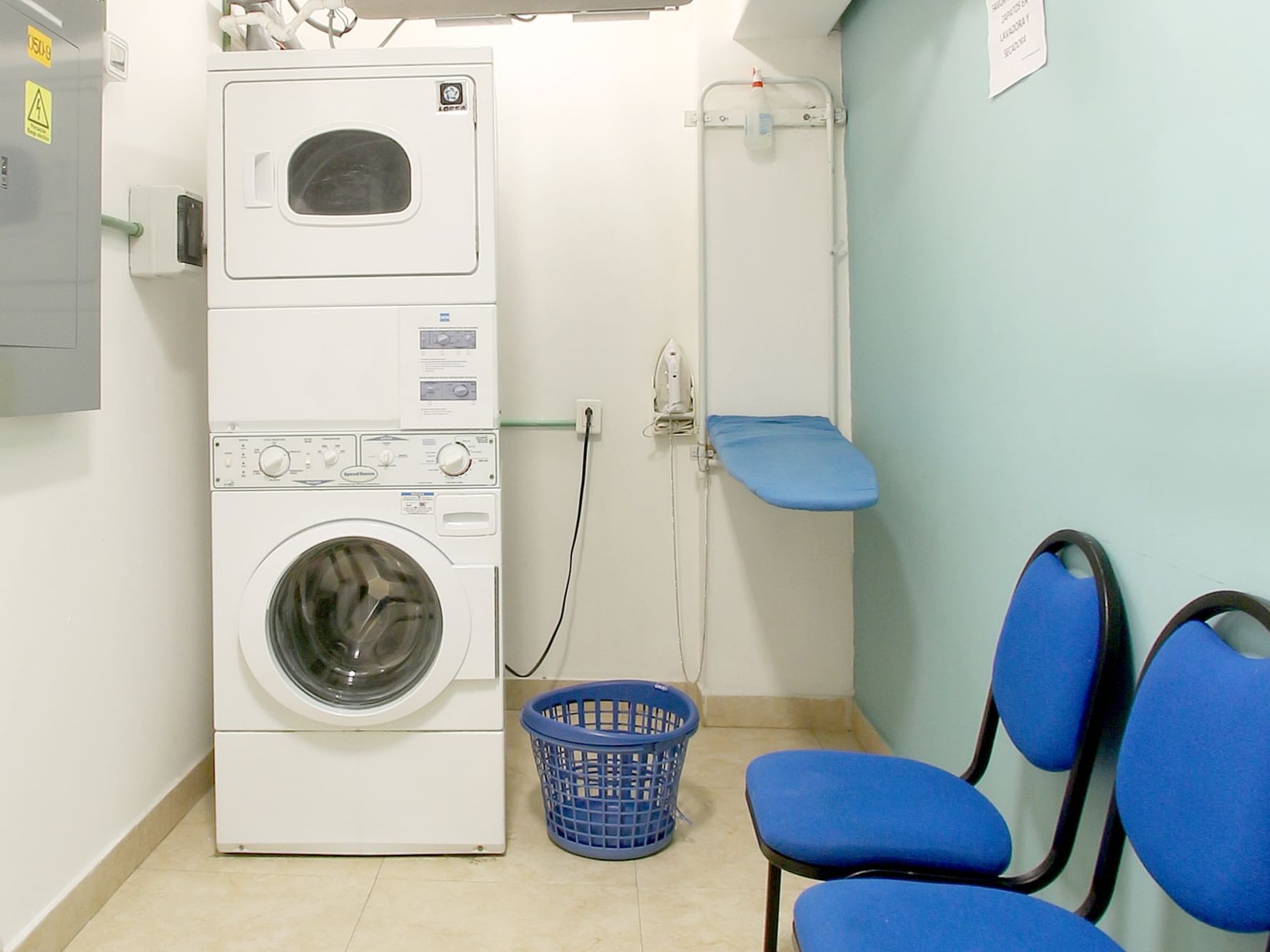 Washing machine and a dryer in Laundry Room at One Hotels