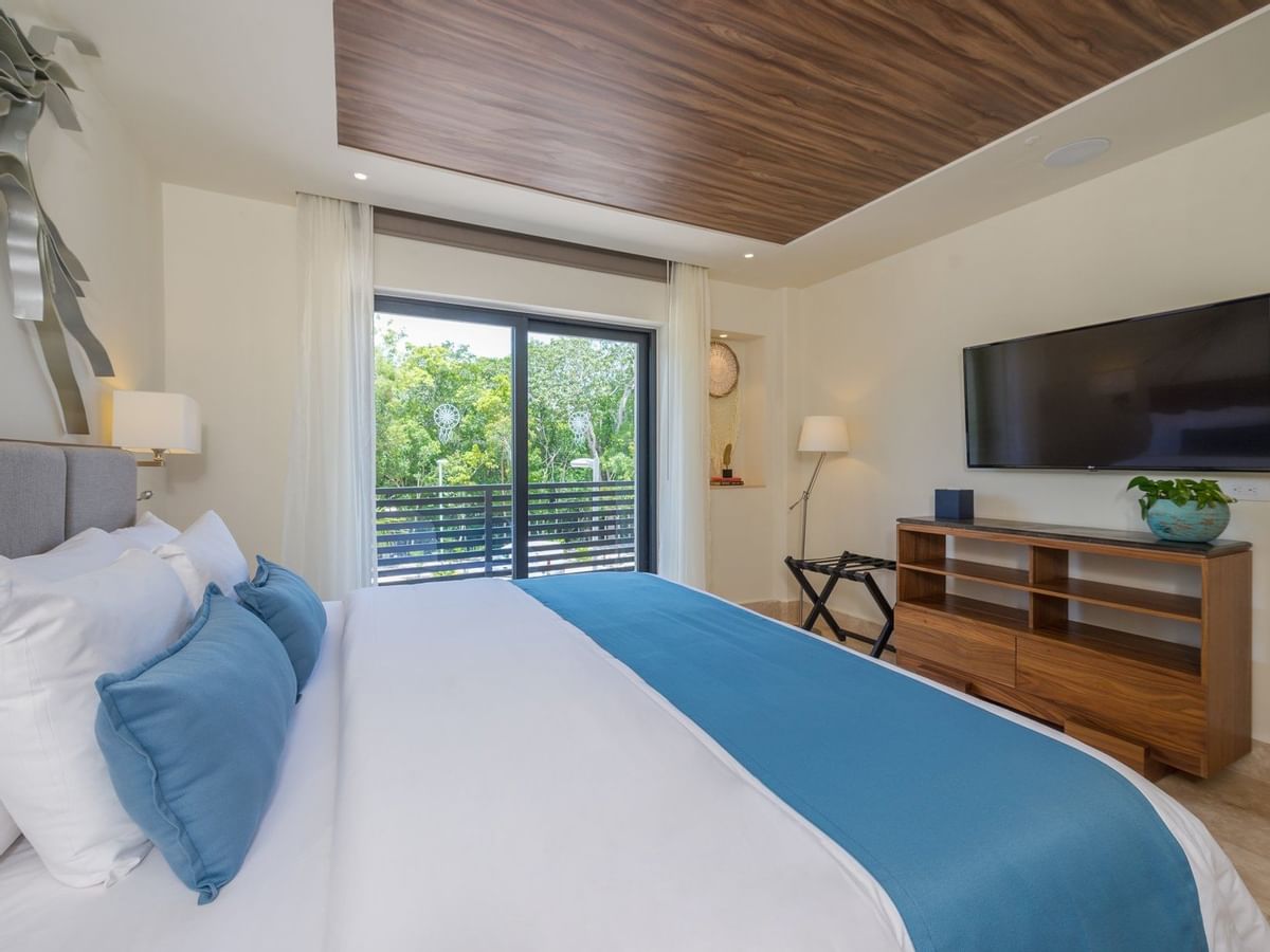 King bed in Junior Suite at Naay Tulum Curamoria Collection