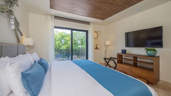 King bed in Junior Suite at Naay Tulum Curamoria Collection