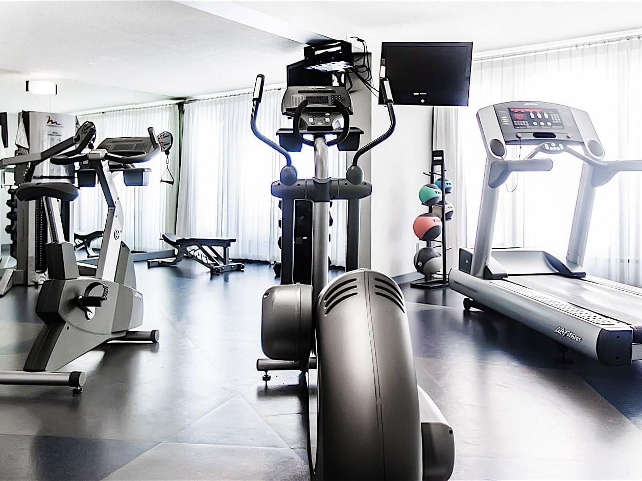 Interior of the fully-equipped fitness center at Matrix Hotel