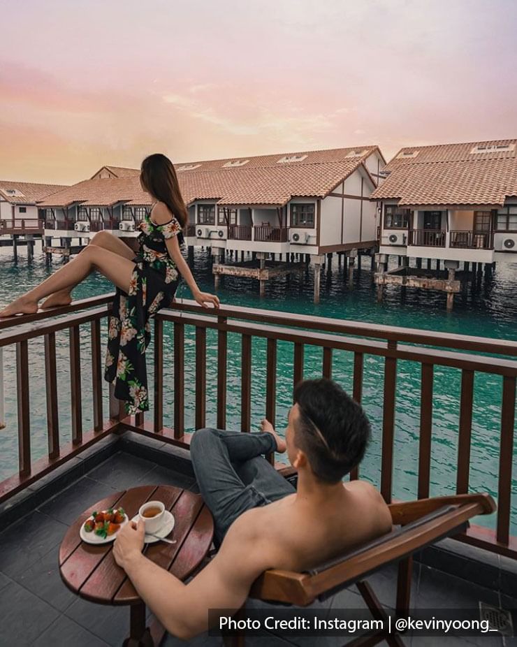 couple overwater villa water chalet lexis port dickson