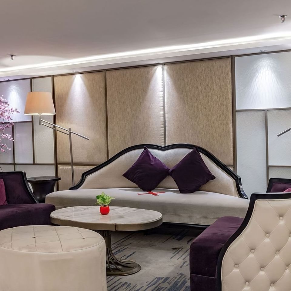 Elegant lobby featuring a large sofa and chairs in Skybar at LK Hotel Simpang Lima