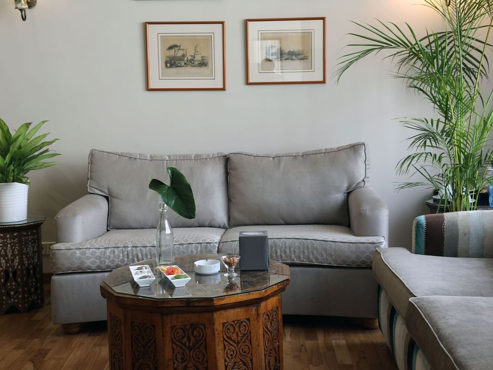 Senior Suite living area with a sofa and coffee table at Warwick Palm Beach Hotel