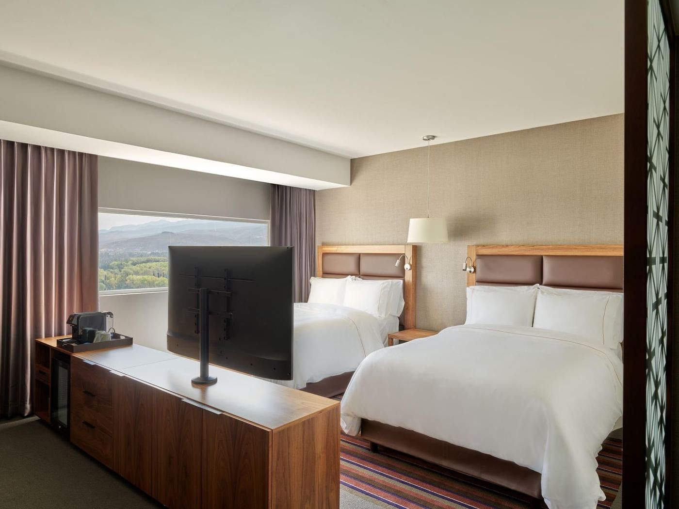 Twin beds in Junior Suite 2 Double at FA Hotels & Resorts