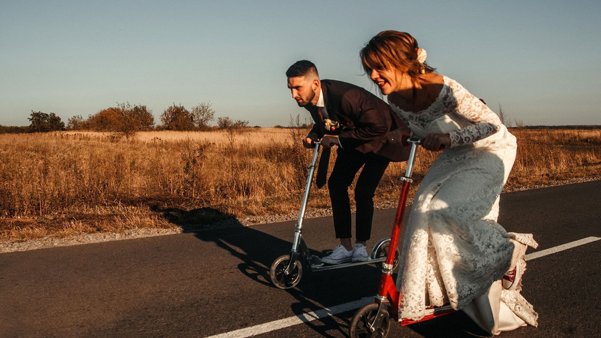 bride and groom riding their scooters