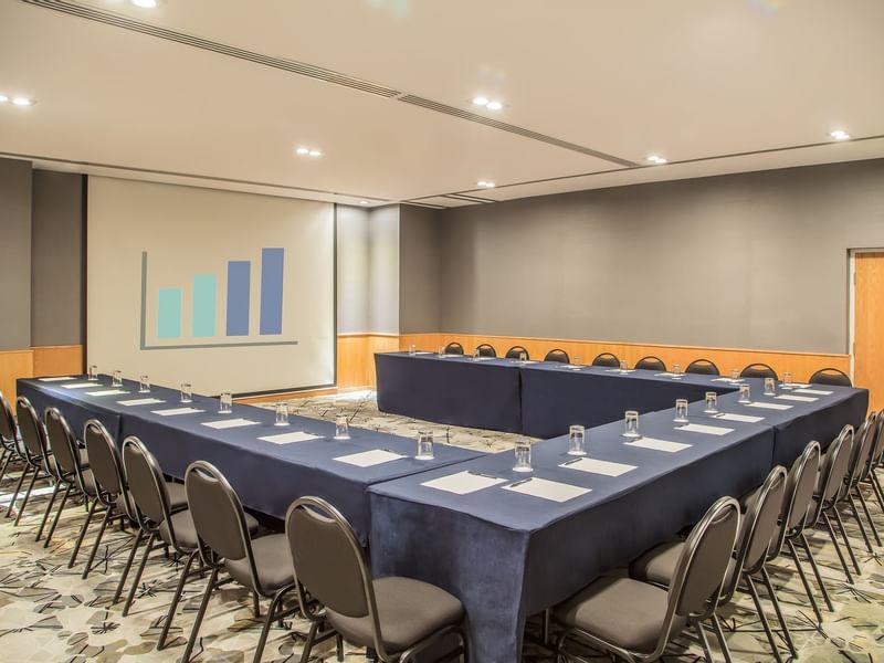 U style meeting table arranged in Salon B at Fiesta Inn Hotels