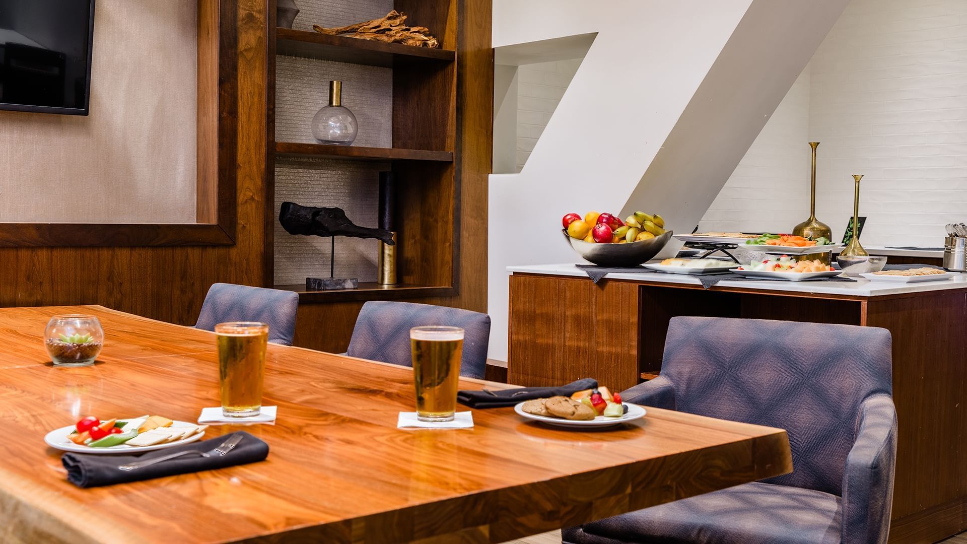 A dining table with food and drinks in a restaurant