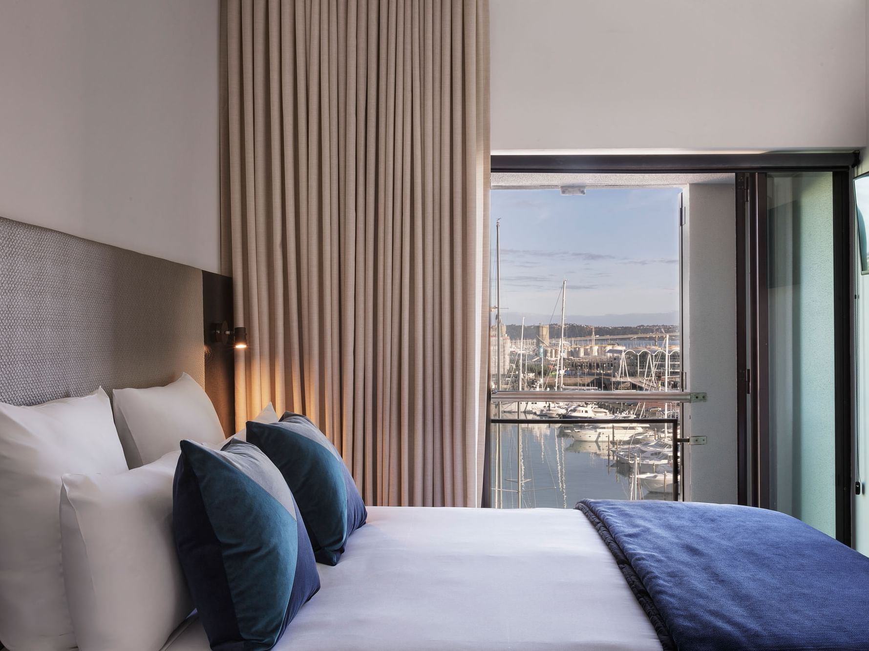 Bedroom with queen size bed at the Sebel Auckland Viaduct Harbour