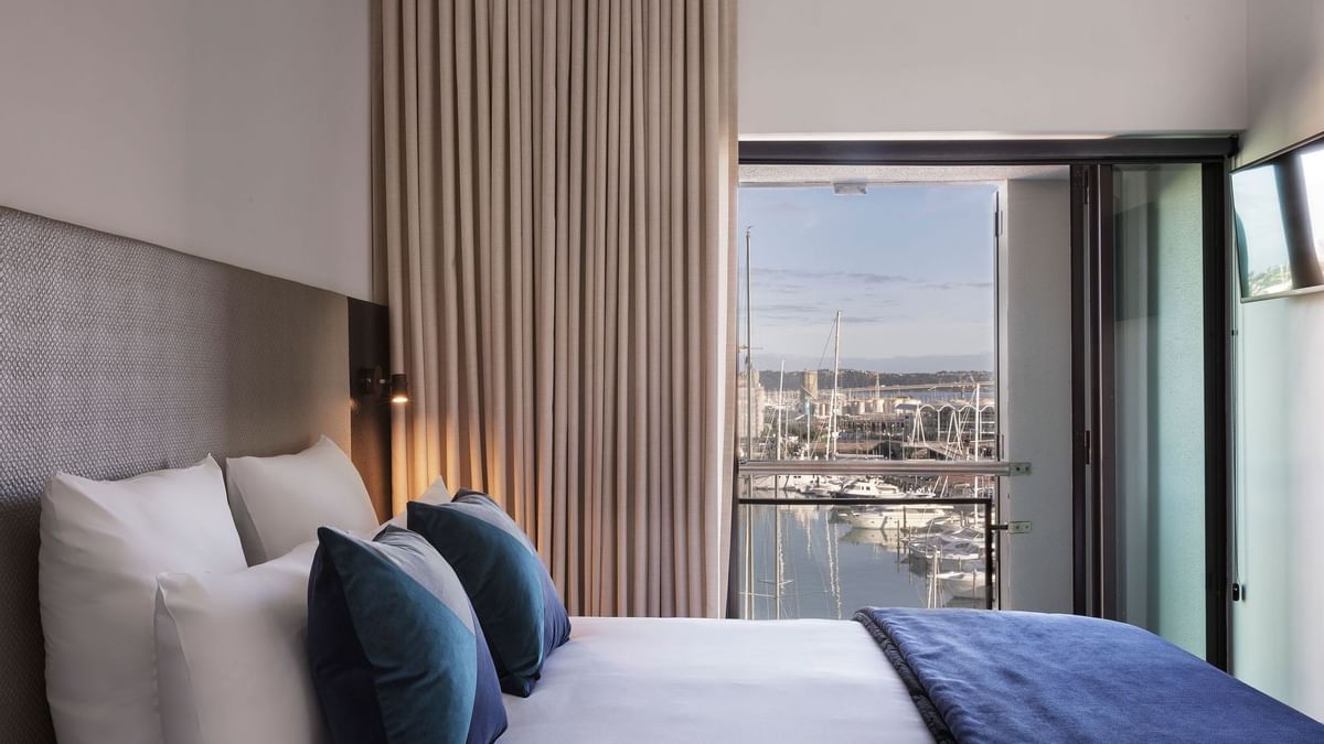 Bedroom with queen size bed at the Sebel Auckland Viaduct Harbour