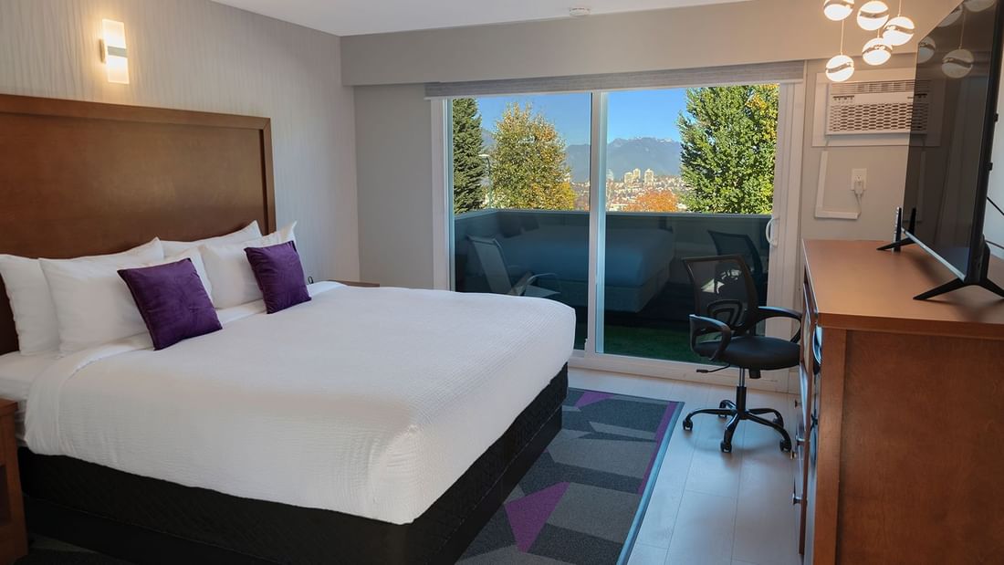 hotel room with one bed and a view of Vancouver's, North Shore m