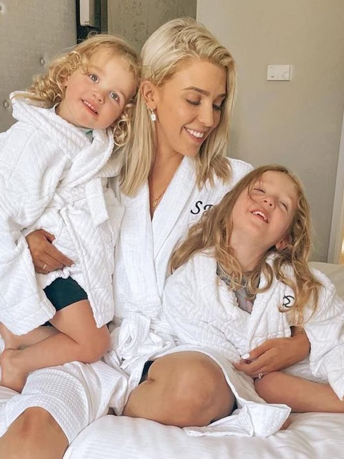 children and a woman spend time at Sofitel Brisbane Central