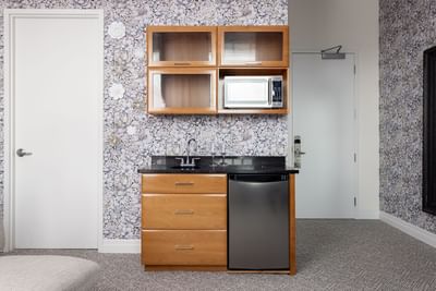 Luxury kitchen area with pantry in King Executive at Retro Suites Hotel