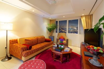 View of Suite living room with furniture at Tamani Marina Hotel
