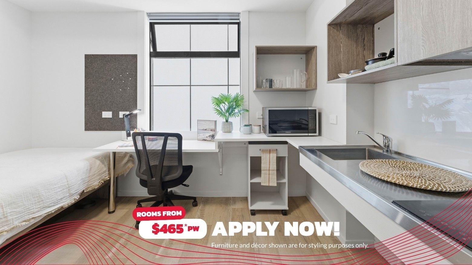 Stylish student room with desk, microwave, sink, and bed at Mayoral Drive Student Accommodation.