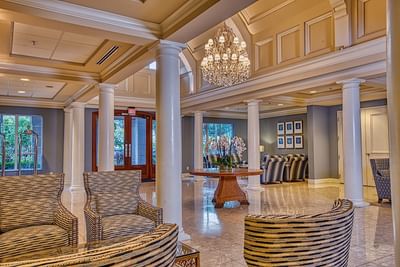 Lobby lounge area by the entrance at Trianon Bonita Bay