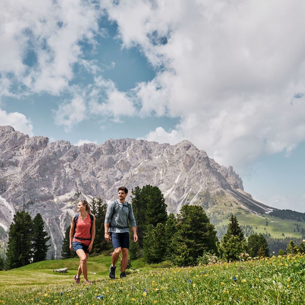 Couple trekking at Carnic Milky Way near Falkensteiner Hotels