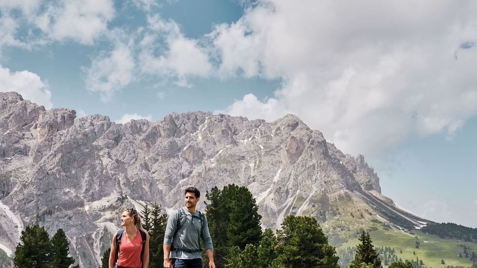 Couple trekking at Carnic Milky Way near Falkensteiner Hotels