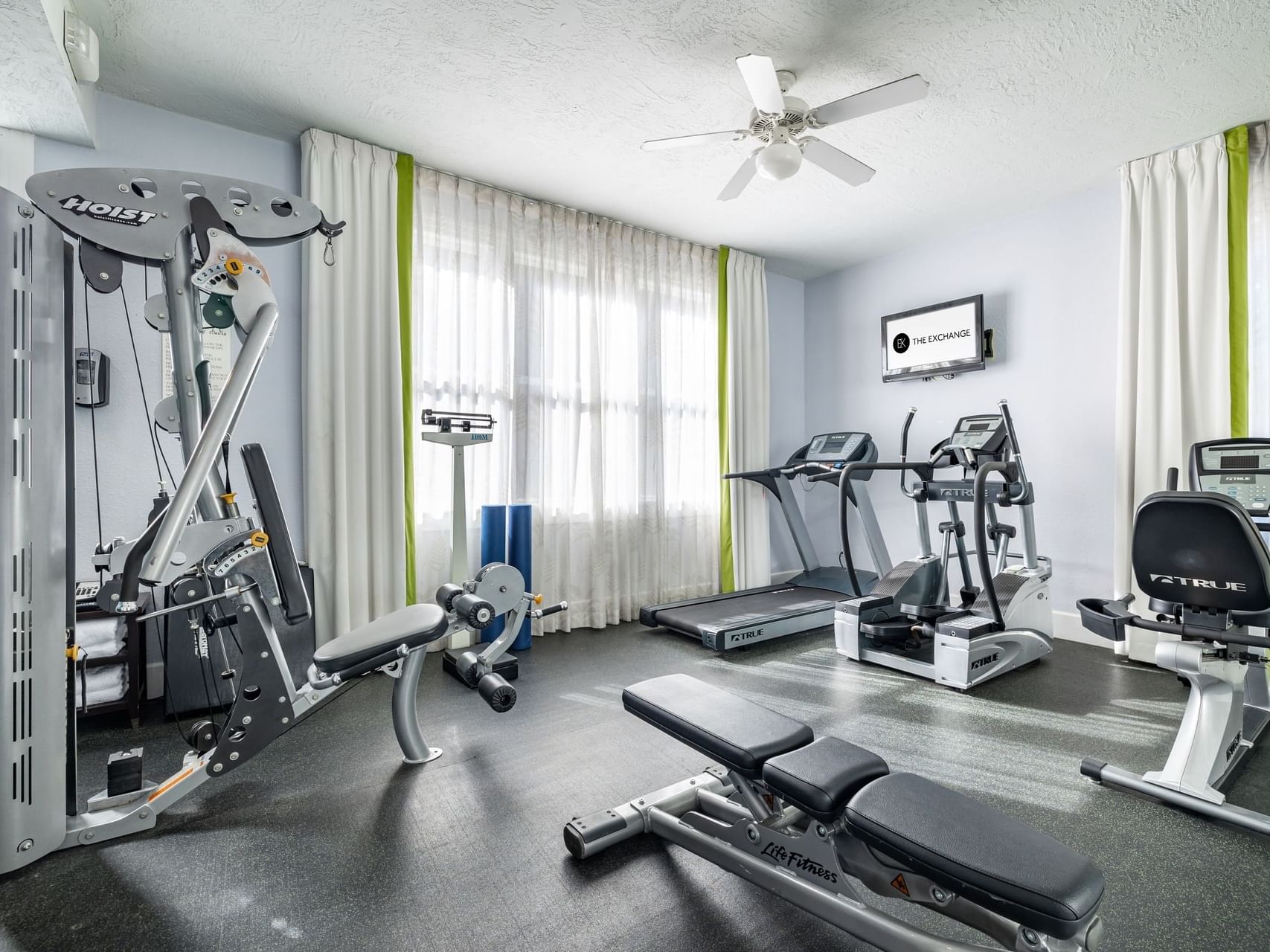 Fitness Center with exercise machines at The Exchange Hotel