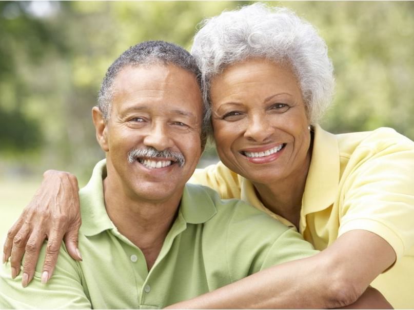 Portrait of smiling elderly couple at Bilmar Beach Resort