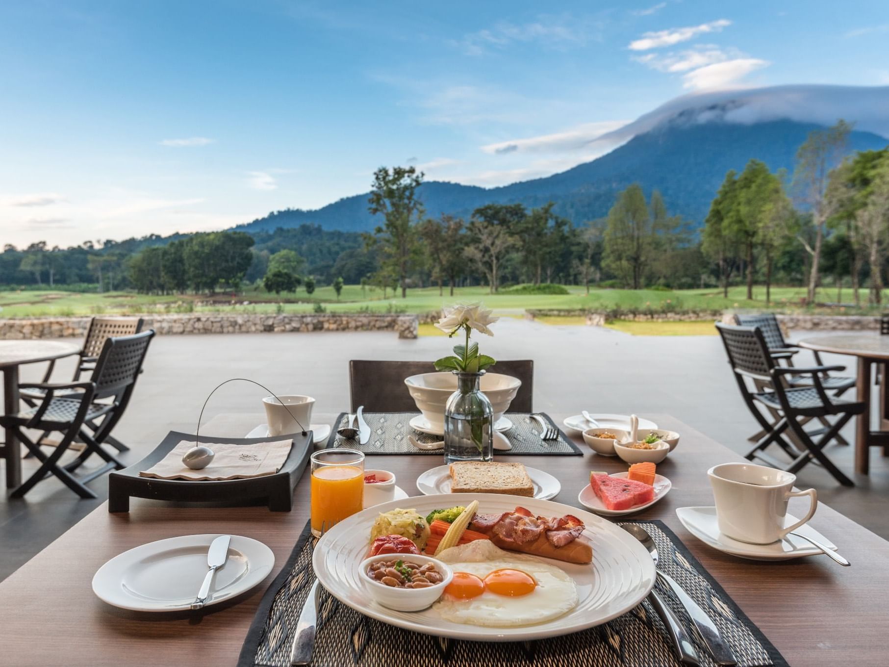 Close-up of served breakfast outside at Chatrium Golf Resort