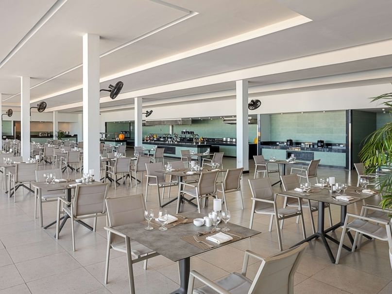 Elegant dining area with tables and chairs set up at Albatros Makadi Resort in Red Sea Governorate.