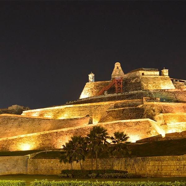 Exterior view of San Felipe Castle at night near DOT Hotels