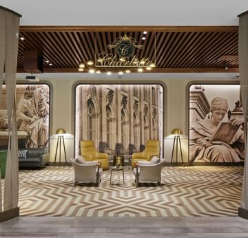 Artistic wall and stylish furniture in Lobby Bar 'Charlotte' at Titanic Chaussee Berlin