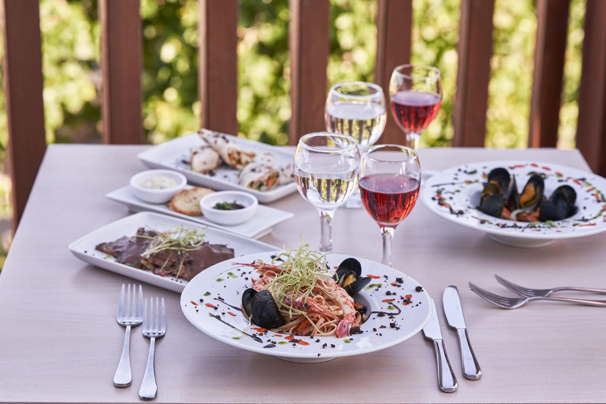 Closeup of a table set for dine in IL-Gusto at Kiotari Miraluna