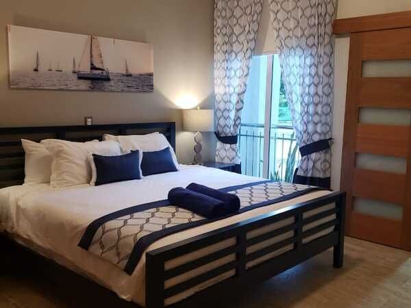 Premium Deluxe room, king bed & painting at Blue JackTar Hotel