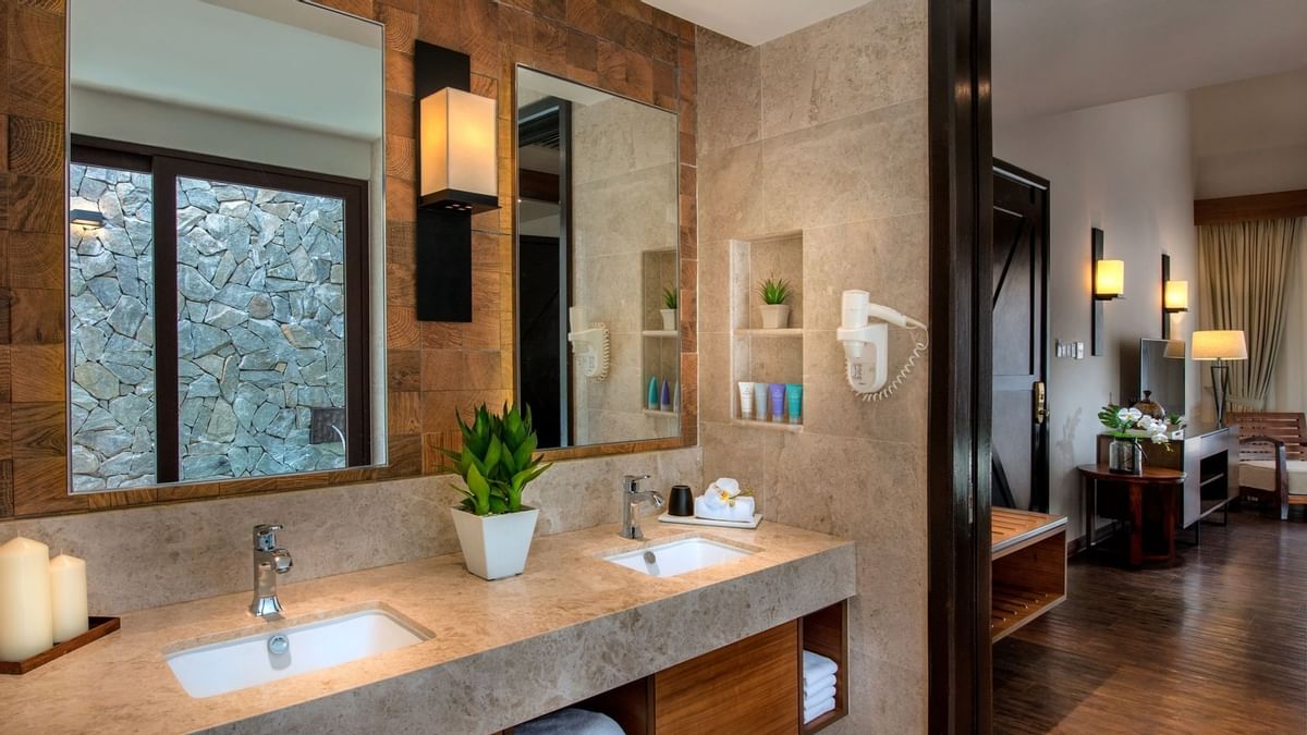 Lake Villa bathroom with dual vanities and modern amenities at The Banjaran Hotsprings Retreat, Ipoh
