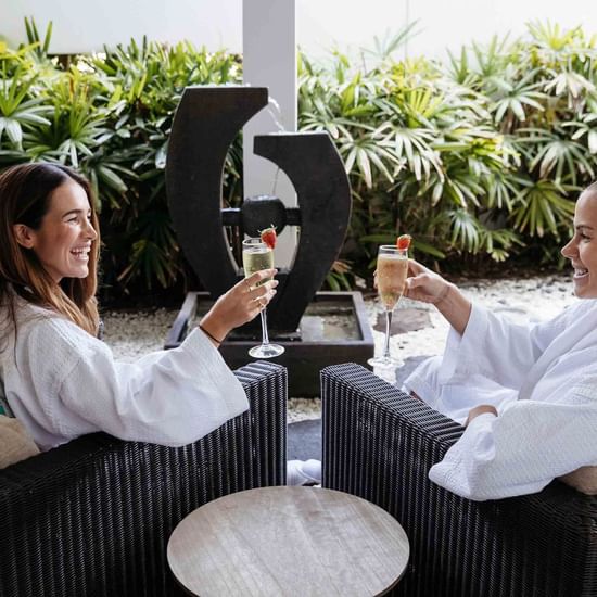 Ladies enjoying a champagne after spa trreatment at Vie Spa Magenta