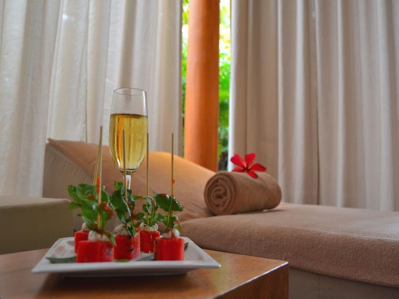 Champagne glass served by a spa bed at FA Hotels & Resorts