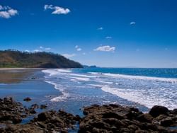 A landscape view of the Samara Beach at Punta Islita Hotel