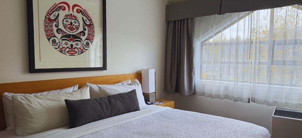 Cozy hotel room with Indigenous artwork
