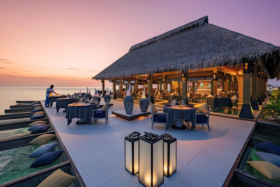 Evening view of the outdoor area at Firedoor fine dining restaurant at Grand Park Kodhipparu