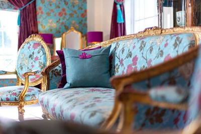 Close-up of a blue sofa at Orsett Hall Hotel